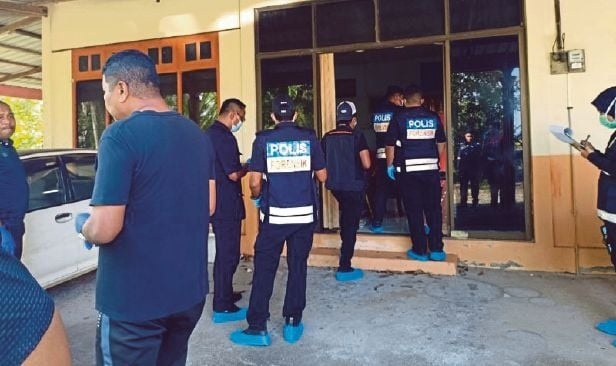 போலீஸ்காரரின் துப்பாக்கி சூட்டிற்கு மாது பலி