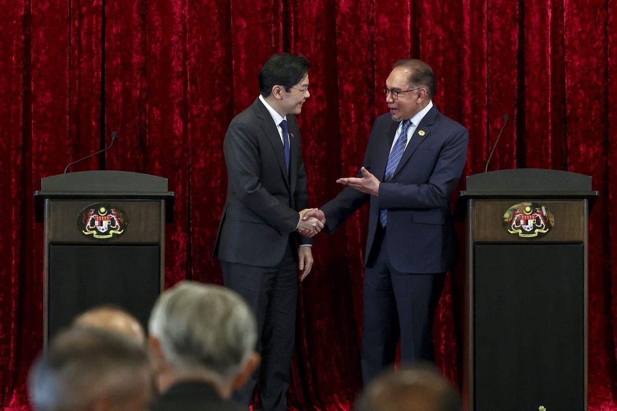 மலேசியாவும் சிங்கப்பூரும் இணக்கம் கண்டன