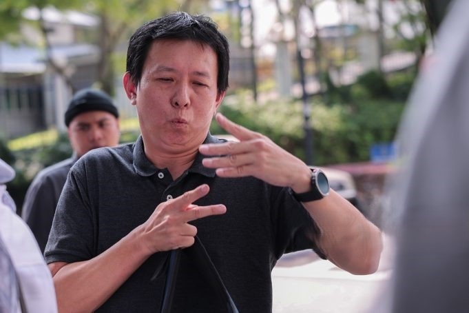 நீதி கோருகிறார் உடல் ஊனமுற்ற e- hailing ஓட்டுநர்