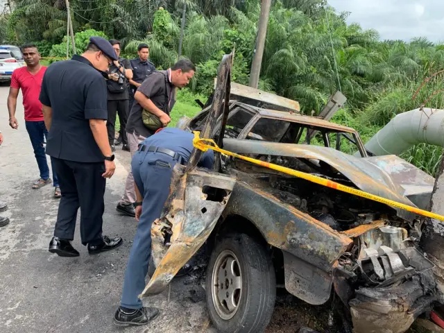 தம்பதியரும் டாக்சியோட்டியும் கருகி மாண்டனர்