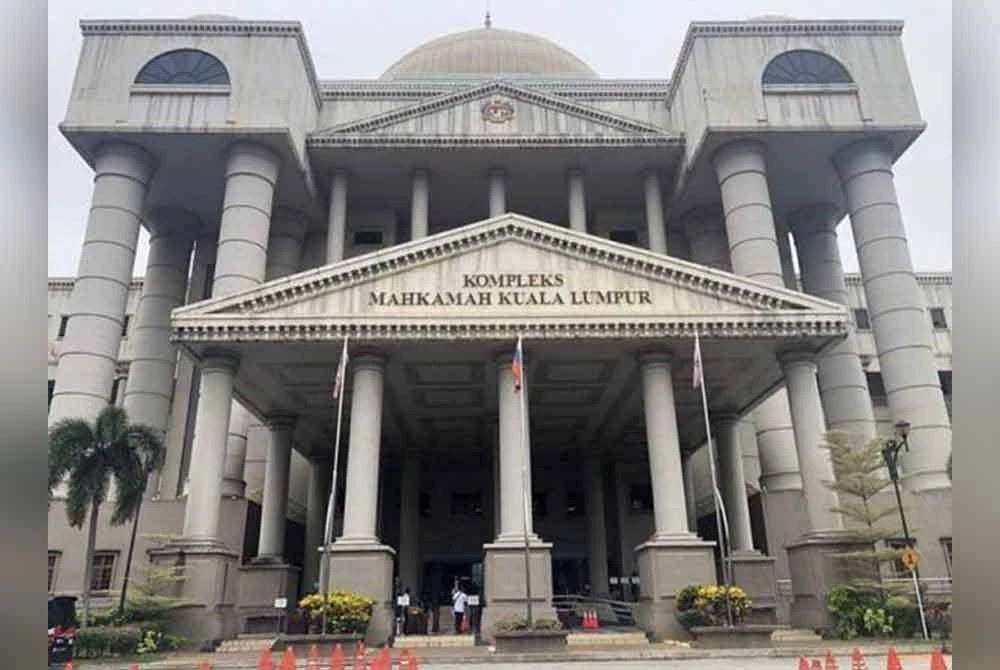 போலீஸ்காரரைக் கொல்ல முயற்சி: வர்ததகர் மீது குற்றச்சாட்டு