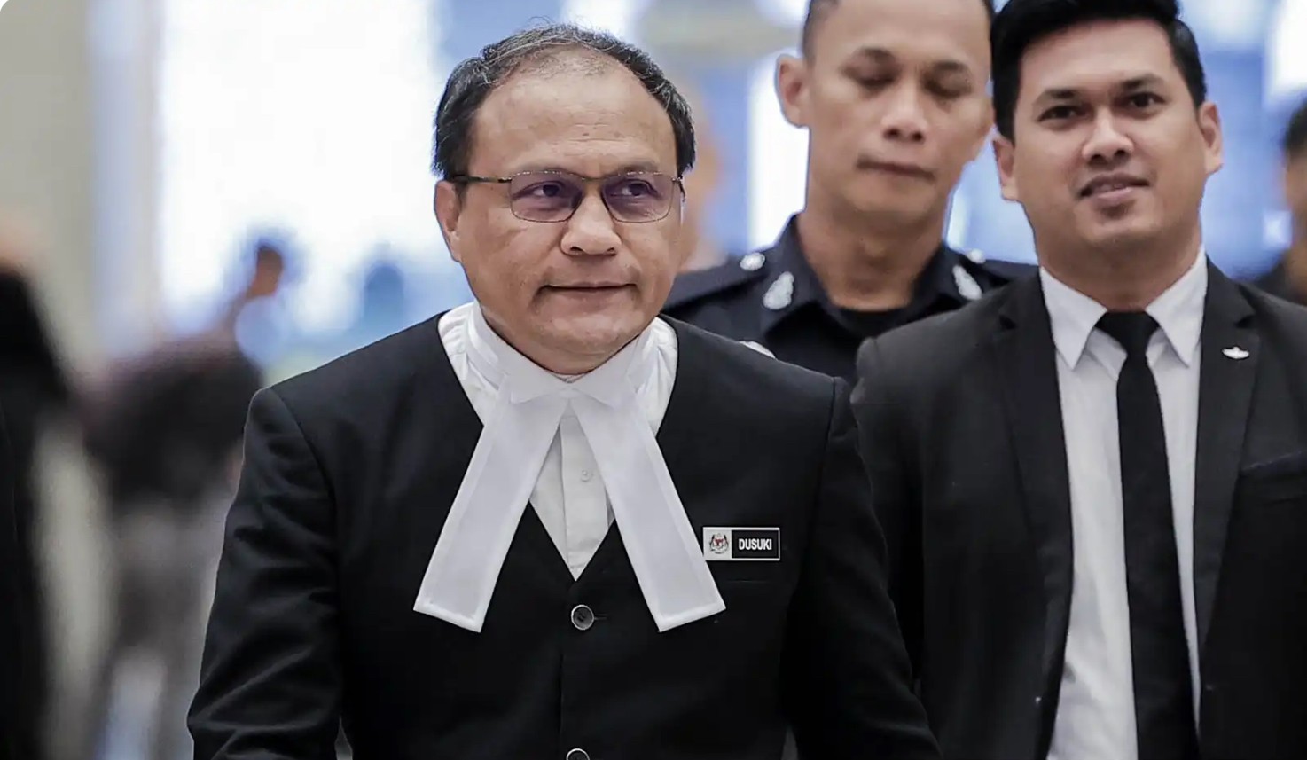 போதைப்பொருள் தொடர்பில் கைது செய்யப்பட்ட டிபிபி, சட்டத்துறை அலுவலகத்திற்குப் பணியிடம் மாற்றம்