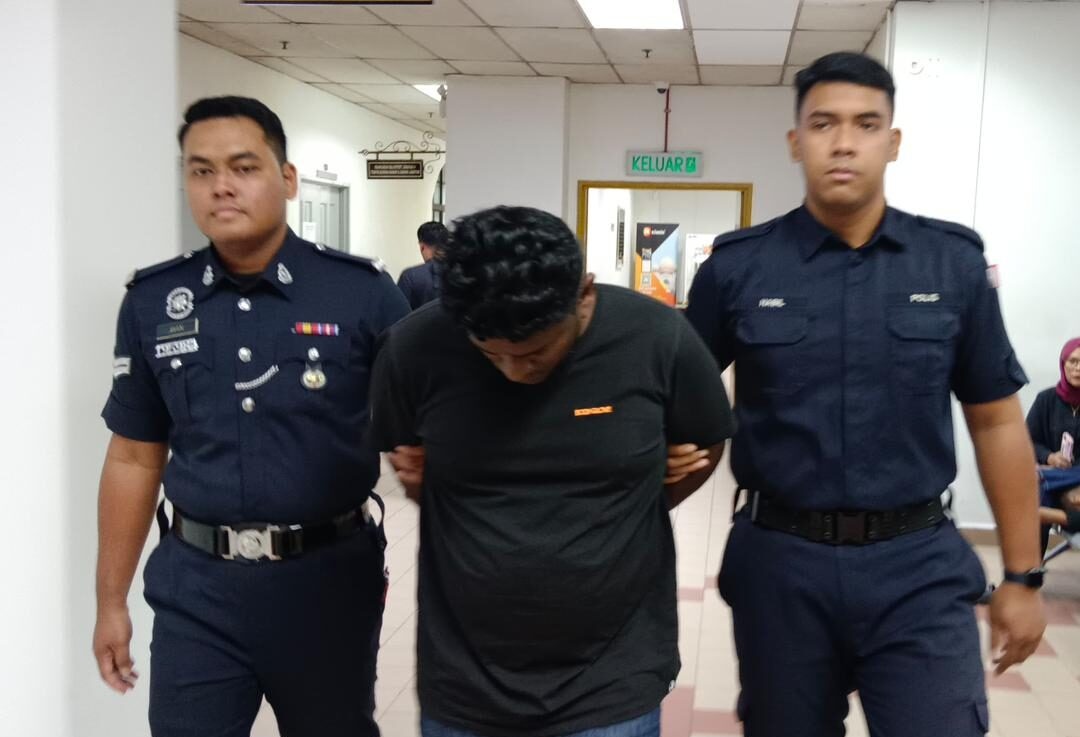 பாதுகாவலரைத் தாக்கிய நபருக்கு 1,800 ரிங்கிட் அபராதம்