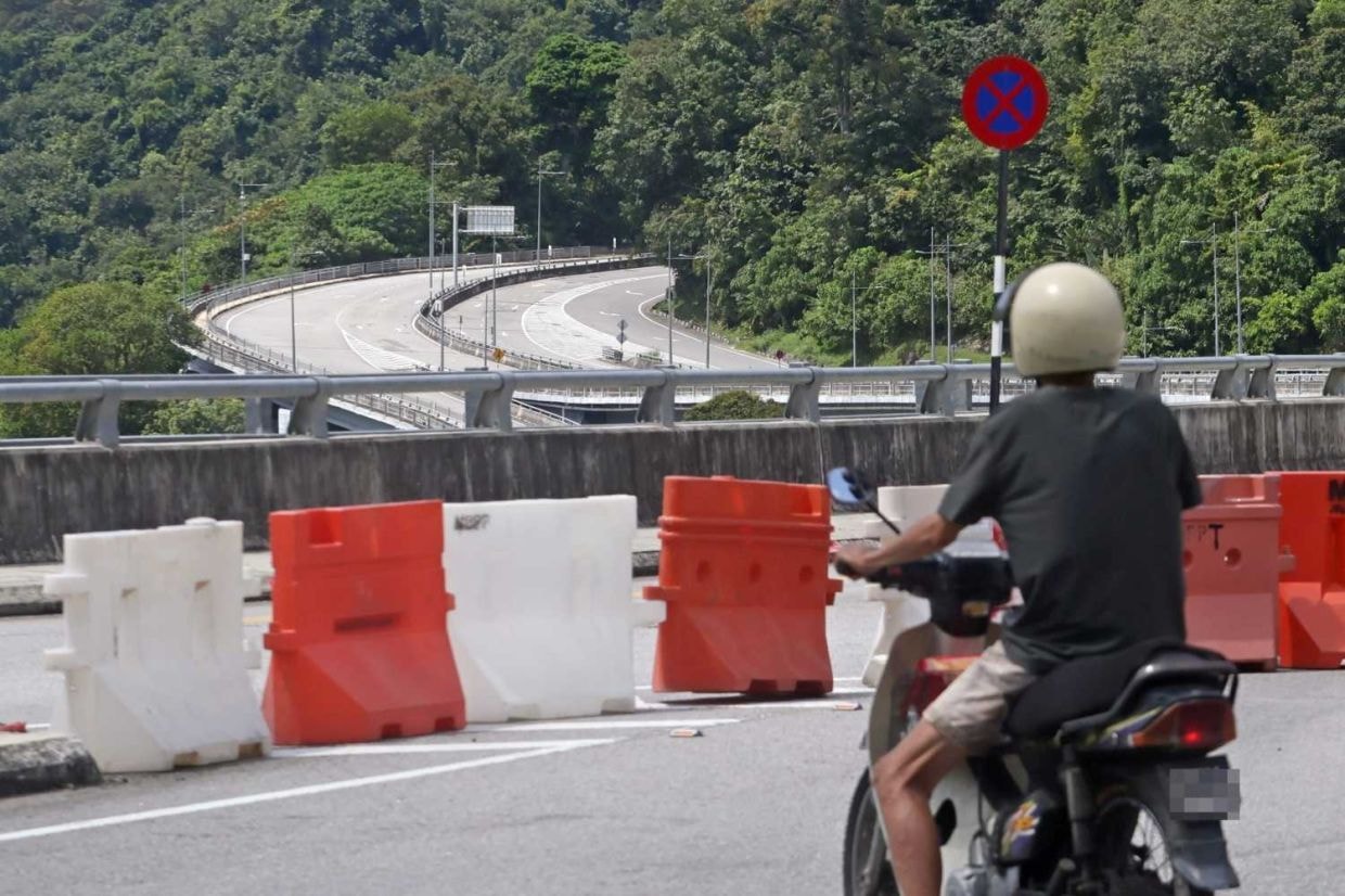 நிலச்சரிவில் மூடப்பட்ட ஜாலான் துன் சார்டோன் சாலை மீண்டும் திறக்கப்பட்டது