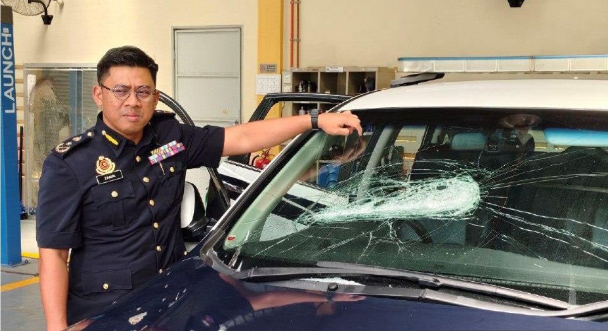 அரசு வாகனத்தின் கண்ணாடிகள் உடைப்பு! மர்ம ஆசாமியை சிசிடிவி மூலம் பிடித்த காவற்படை!