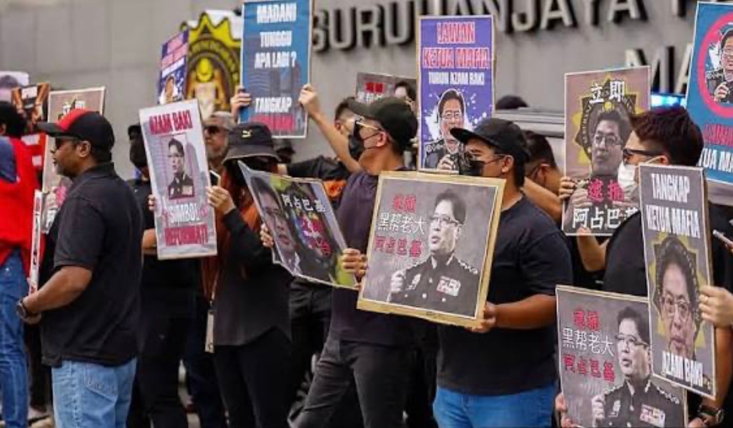 அஸாம் பாக்கி சர்ச்சை: ஊழல் தடுப்பு ஆணையத் தலைமையகத்திற்கு வெளியே 70 பேர் போராட்டம்